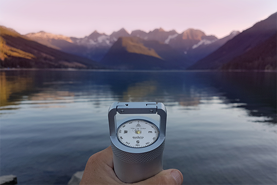A professional Suunto compass in the VSSL survival gear