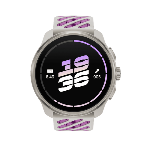 A Suunto sport watch Race 3S with a round black display showing a digital clock, featuring a white and purple perforated silicone strap, isolated on a white background.